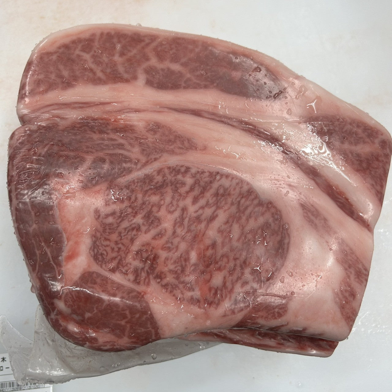 【現物写真】冷凍 国産交雑牛リブロース 栃木県産 409左 4.4kg 単価5,550/kg（税込） 賞味期限2028年09月16日
